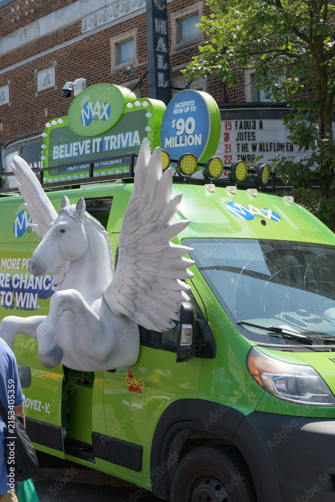Fototapeta premium detail of OLG (Ontario Lottery and Gaming Corporation) promotional/marketing vehicle for LOTTO MAX at Taste of the Danforth 2026, Toronto