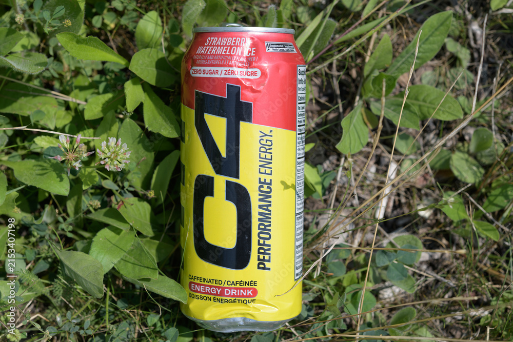 Fototapeta premium discarded can of C4 energy drink on the ground in Toronto (beverage produced by Cellucor; owned by Nutrabolt)