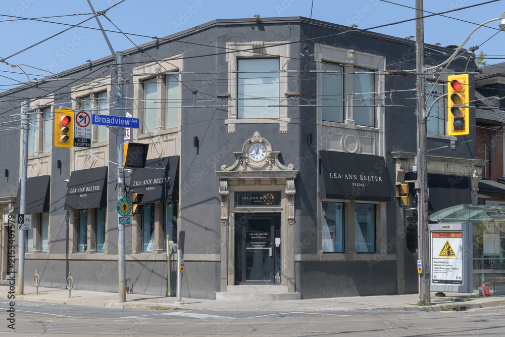 Fototapeta premium exterior building facade and sign of Lea-Ann Belter Bridal located at 238 Broadview Av, Toronto