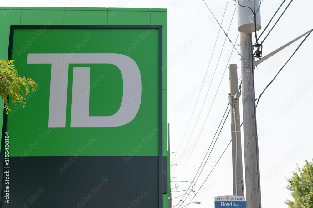 Fototapeta premium close-up of TD sign outside a branch located at 991 Pape Av (East York), Toronto