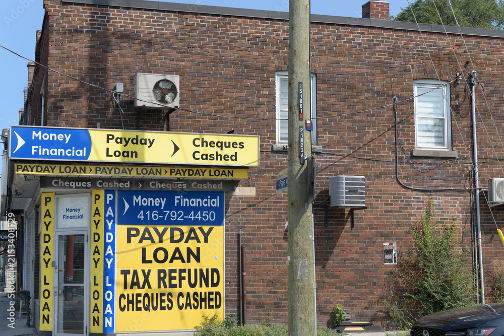 Fototapeta premium signage outside Money Financial, a loan agency, located at 1023 Pape Av (East York), Toronto
