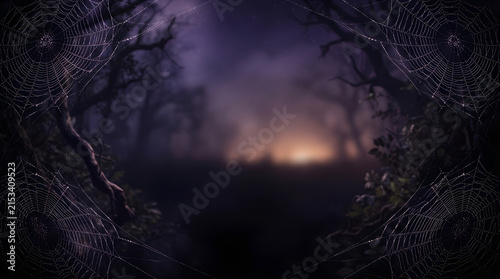 A captivating forest landscape features a warmly glowing campfire beneath a breathtaking starry night sky evoking a profoundly magical and serene atmosphere
