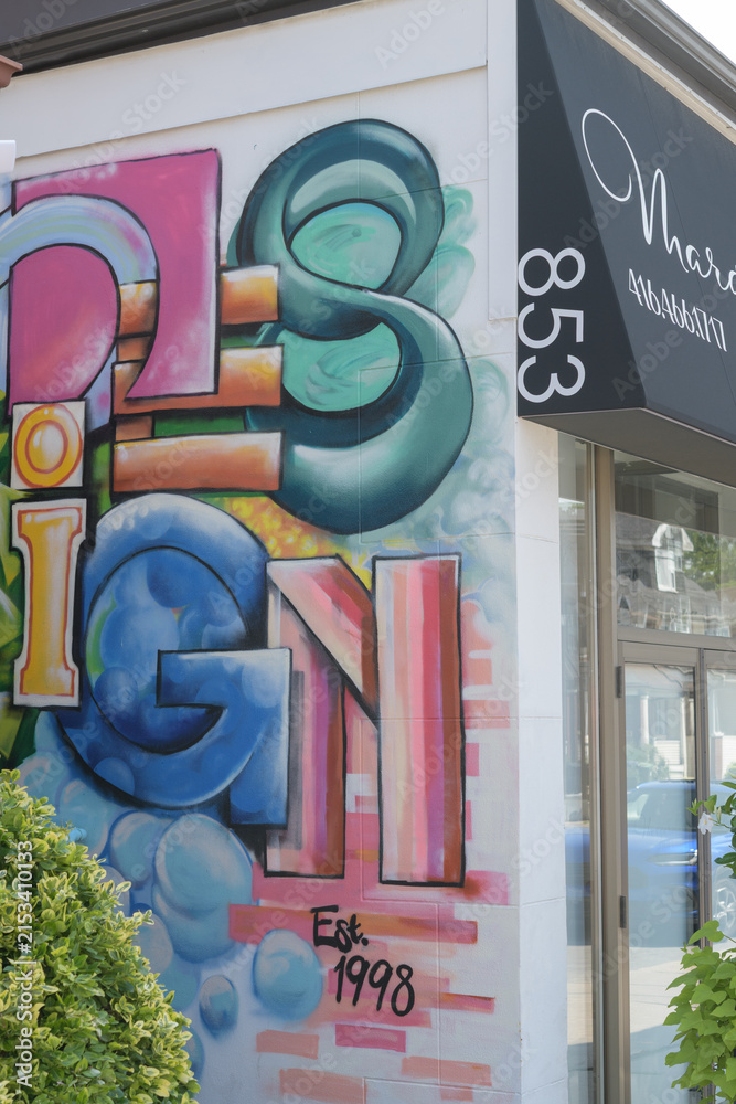 Fototapeta premium design mural and part of a sign outside 853 Pape Av (Margaret’s Hair Salon / Ma Zone Design Lab), East York, Toronto
