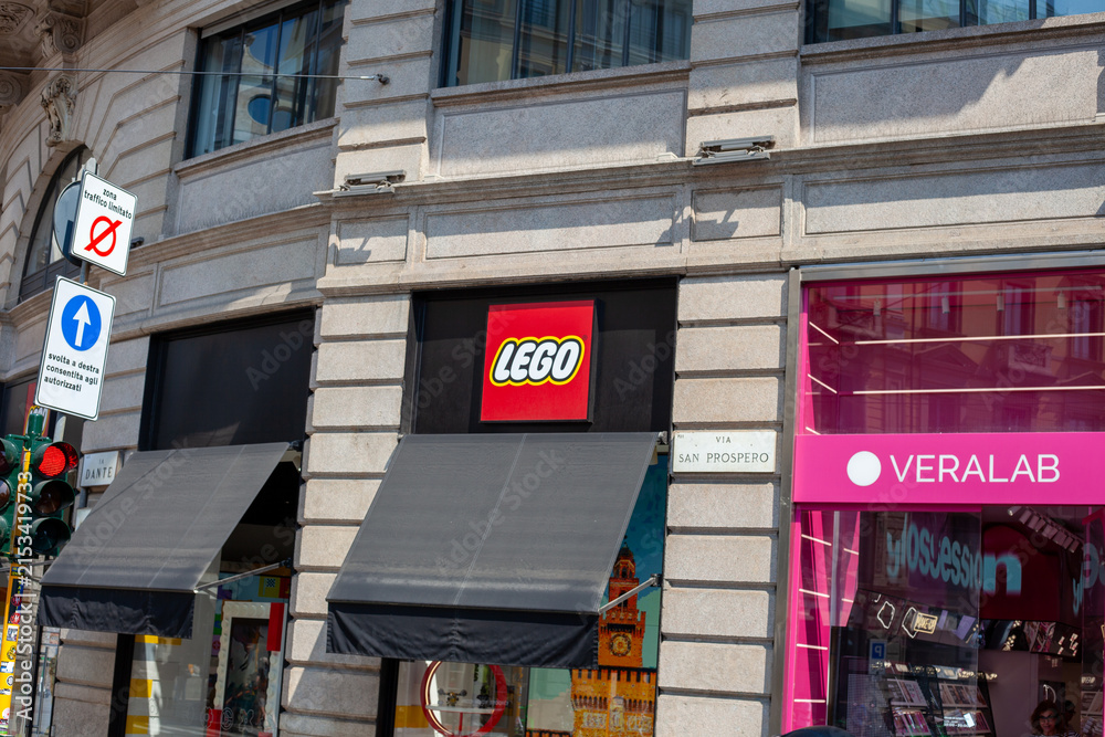 Fototapeta premium Lego shop Exterior View Storefront on Corner of Via Dante and Via San Prospero street. Logo sign on entrance wall. Milan, Italy - June 24, 2026