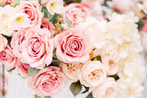 Close up of beautiful blooming pink roses backgroundElegant wedding floral decoration with pastel pink roses bouquetRomantic background pattern of fresh soft pink rose flowers.