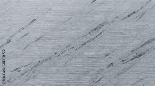 Close-up of weathered white wooden surface with natural grain and subtle cracks displaying rustic texture