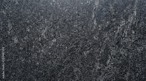 Close-Up of Cracked Asphalt Road Surface Showing Rough Texture and Fine Details 50 characters