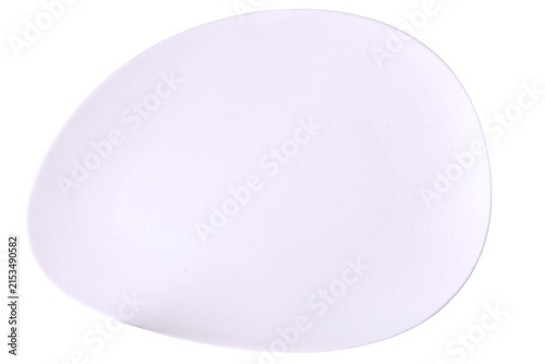 Konstfotografi white ceramic plate for food serving, asymmetrical pebble shape, top down view,
