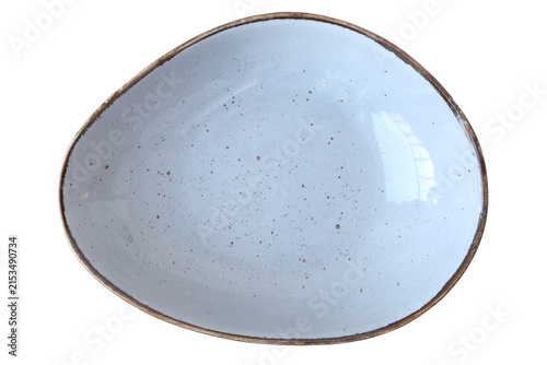 Canvastavla light blue ceramic bowl, asymmetrical triangular shape, top down view, tableware