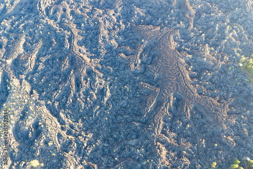 A bird's eye view of an ancient lava field shows an extremely rugged and inhospitable landscape near Bend, Oregon. This vast area is part of the volcanic Cascade Mountain Range.