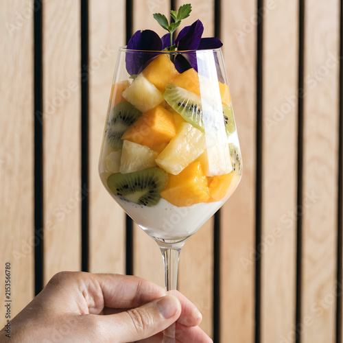 High-End Restaurant Style Colorful Mango and Pineapple Treat in Stem Glass