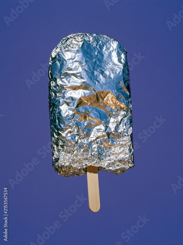 Emergency Blanket Ice Pop with Fine Silver Wrinkles on Electric Purple Background