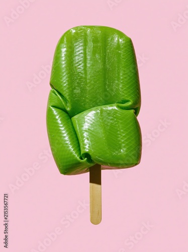 Green Garden Hose Ice Pop with Broad Compressed Loops on Bubblegum Pink Background