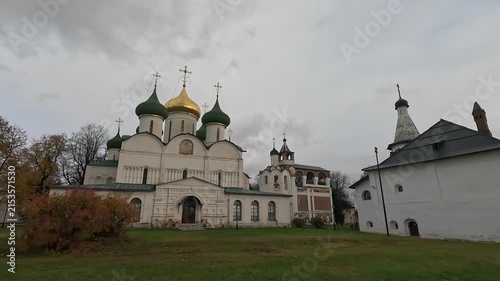 view of the Transfiguration Cathedral and the bell tower with the clock of the Savior-Euthymius Monastery, courtyard, Suzdal