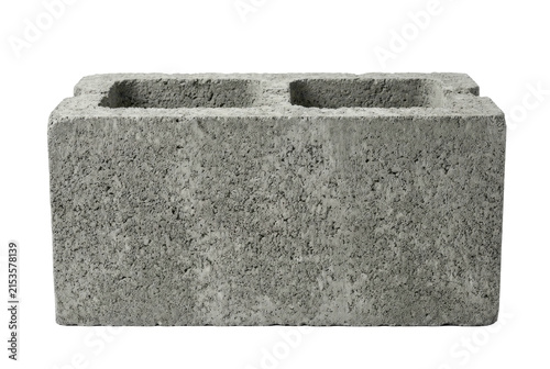 Standard grey concrete cinder block on black background