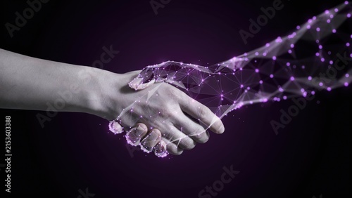 Human hand shaking a digital wireframe hand on dark background