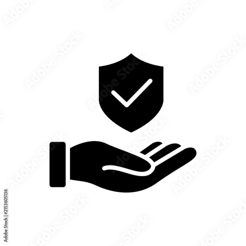 Hand holding a shield icon for security and trust concept