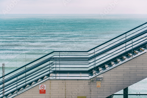 A modern outdoor concrete staircase with ocean view at Larcomarshopping complex in Miraflores, Lima