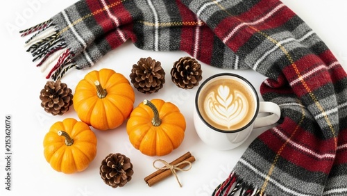 Cozy Autumn Flat Lay with Cup of Latte Art Coffee Pumpkins Pinecones Cinnamon Sticks and Plaid Scarf on White Background