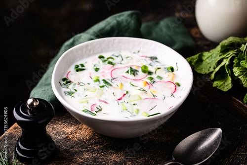 Fotografie Okroshka traditional summer Russian cold soup with radish and ayran