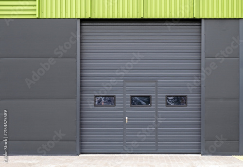 Modern steel commercial garage or warehouse doors, abstract industrial background
