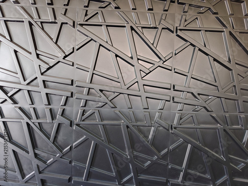 Obraz na plátně Metallic geometric patterns dominate the surface