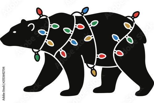 Silhouette of a black bear tangled in colorful Christmas fairy lights.