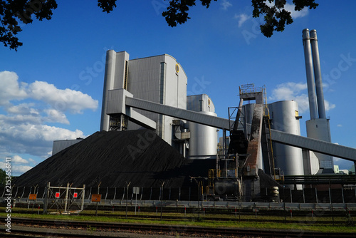 Coal fired power plant with stone coal dump in Hanover Stoecken, Lower Saxony, Germany. An old technology that is partly responsible for global warming. 