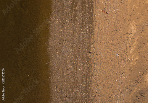 Canvastavla Dry and shallow riverbed with exposed rocks and stones during prolonged summer drought