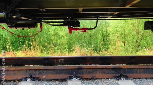 Close railway wheel assembly moves along a narrow gauge track