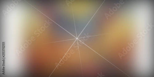 Abstract starburst background with light rays and soft color blend.