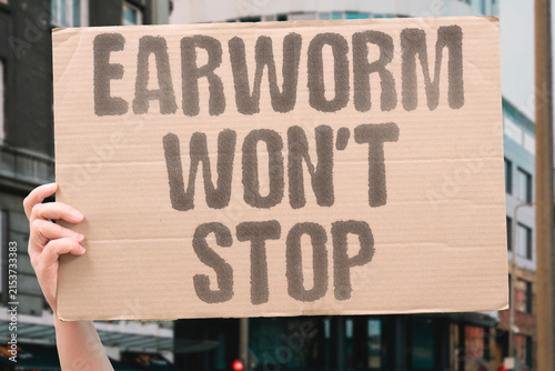 Cuadro en lienzo "Earworm Won't Stop" An unwanted song keeps playing in your head after it stops