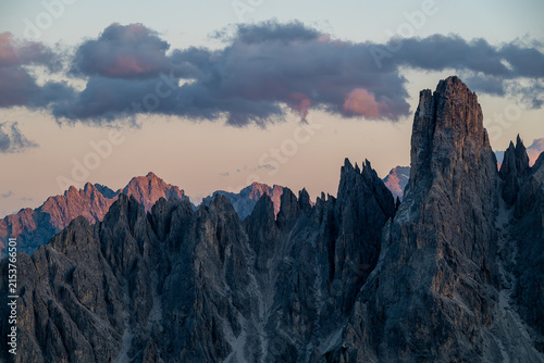 Sunset with clouds over the Italian Dolomite mountains