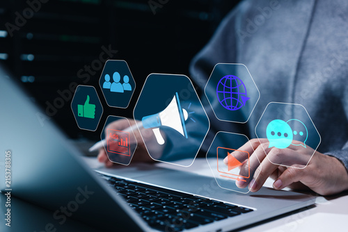 Digital marketing and online advertising concept shows megaphone, audience, social engagement, video, communication icons as marketer manages promotional campaigns, brand outreach, customer engagement