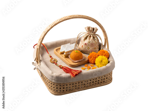Obraz na plátne Festive Raksha Bandhan gift hamper with handcrafted rakhi, Indian sweets, flowers and decorative elements isolated as a transparent PNG festival asset
