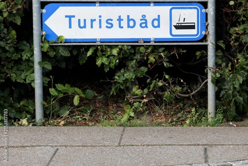 Tourist boat road sign and direction in Skanderborg called turistbad in Danish language