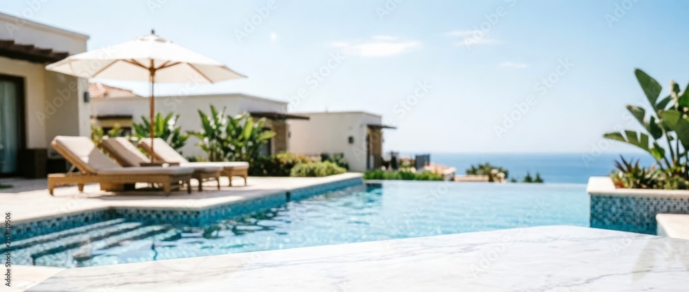 Fototapeta premium Luxury Poolside Retreat with Ocean View for Travel Marketing