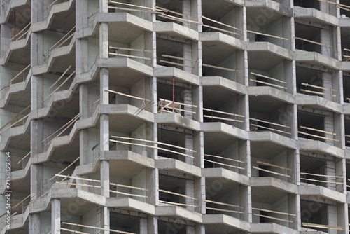 Reinforced concrete structure of high rise residential building under construction, showing modern construction methods, architectural engineering and urban development process