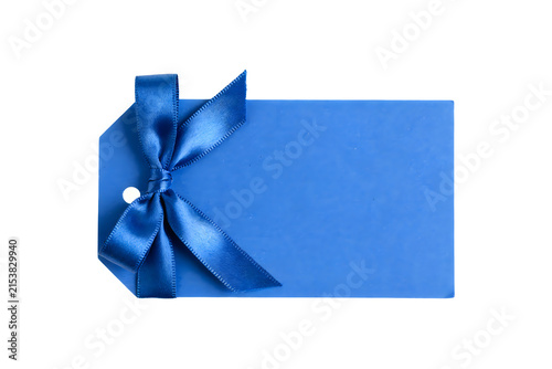Royal blue gift tag with a satin ribbon bow isolated on transparent background