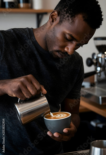African american barista po...