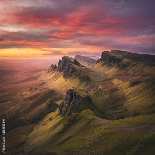 Dramatic Mountain Landscape with Golden Sunset and Rugged Peaks