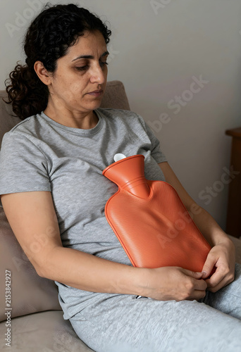 Woman experiencing abdomina...