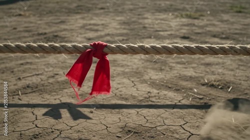 Red ribbon on rope shaking outdoor 4K Video