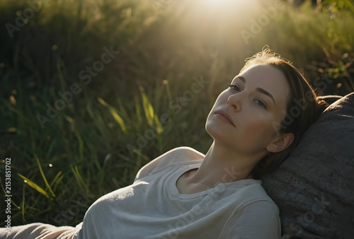 Young woman relaxing outdoo...