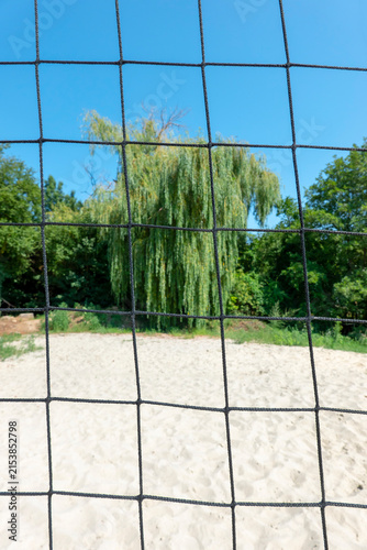 Sandy beach playground with net