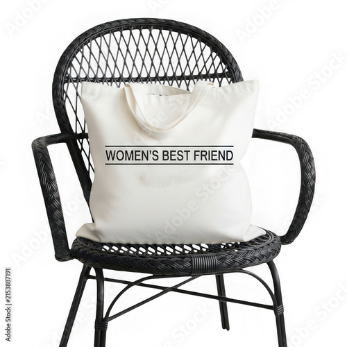 Modern wicker chair with white cushion