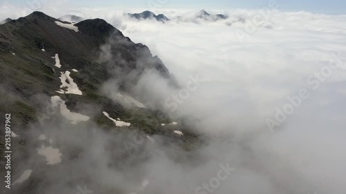 Eastern Black Sea Mountains in Rize Turkey rise above clouds with rugged ridges and misty peaks.