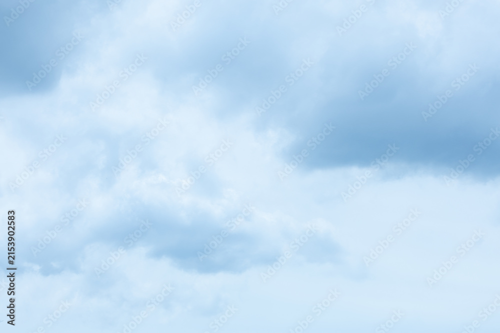 Obraz premium Soft blue fluffy clouds filling the sky for a natural background.