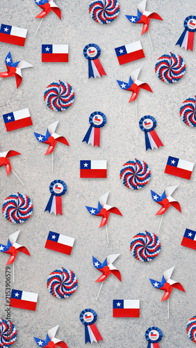 Chilean flags, cockades, and pinwheels creating a festive pattern for national celebrations
