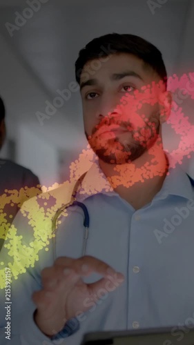 Medical professionals discussing patient data over DNA strand animation